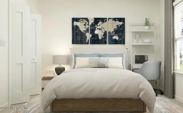 a large white bed in a white room