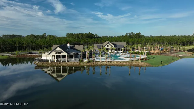 a house with river in front of it