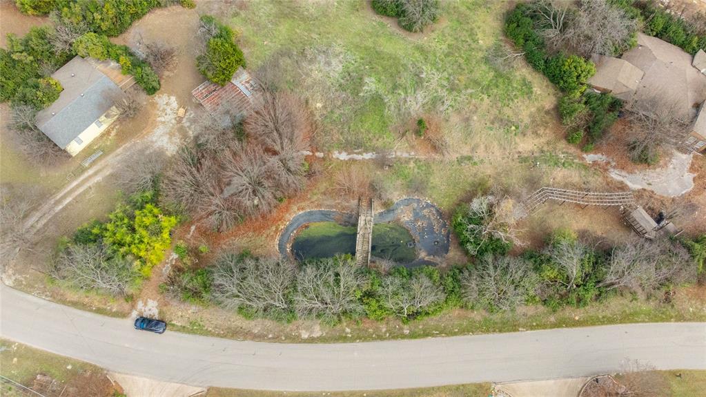 382 Dublin Road Parker, TX 75094 - Photo 21 of 25 a view of a garden with a fountain