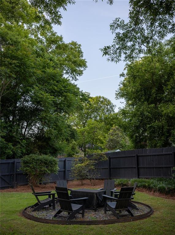 266 Atlanta Avenue Southeast Atlanta, GA 30315 - Photo 66 of 70 a view of a backyard with plants and a tree