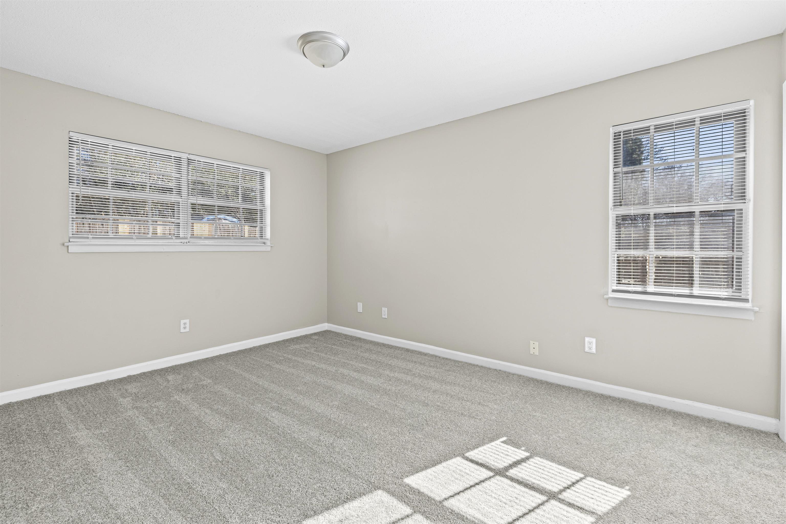 4982 Holly Ridge Drive Memphis, TN 38118 - Photo 13 of 26 an empty room with windows