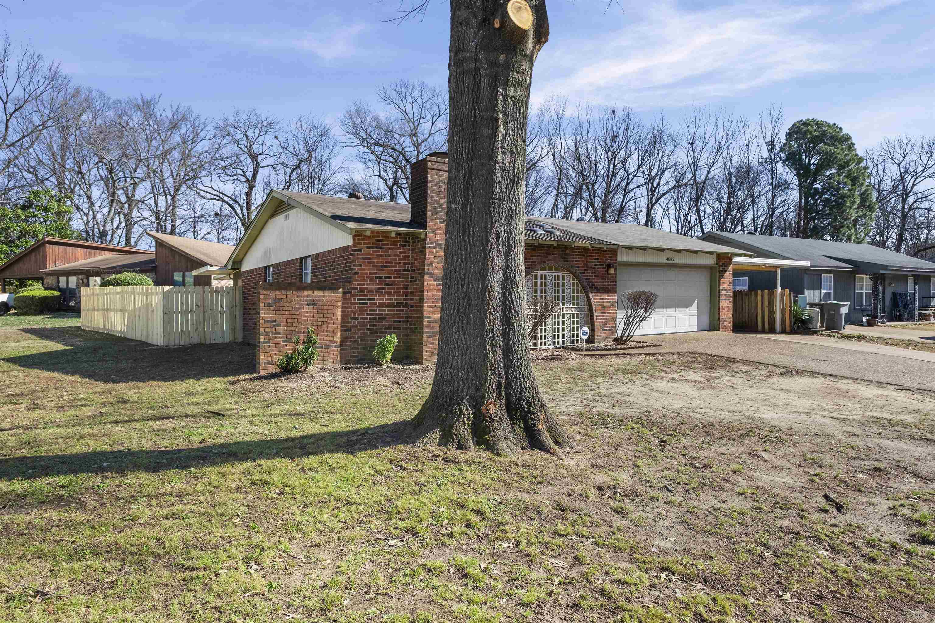 4982 Holly Ridge Drive Memphis, TN 38118 - Photo 23 of 26 a view of a house with a yard