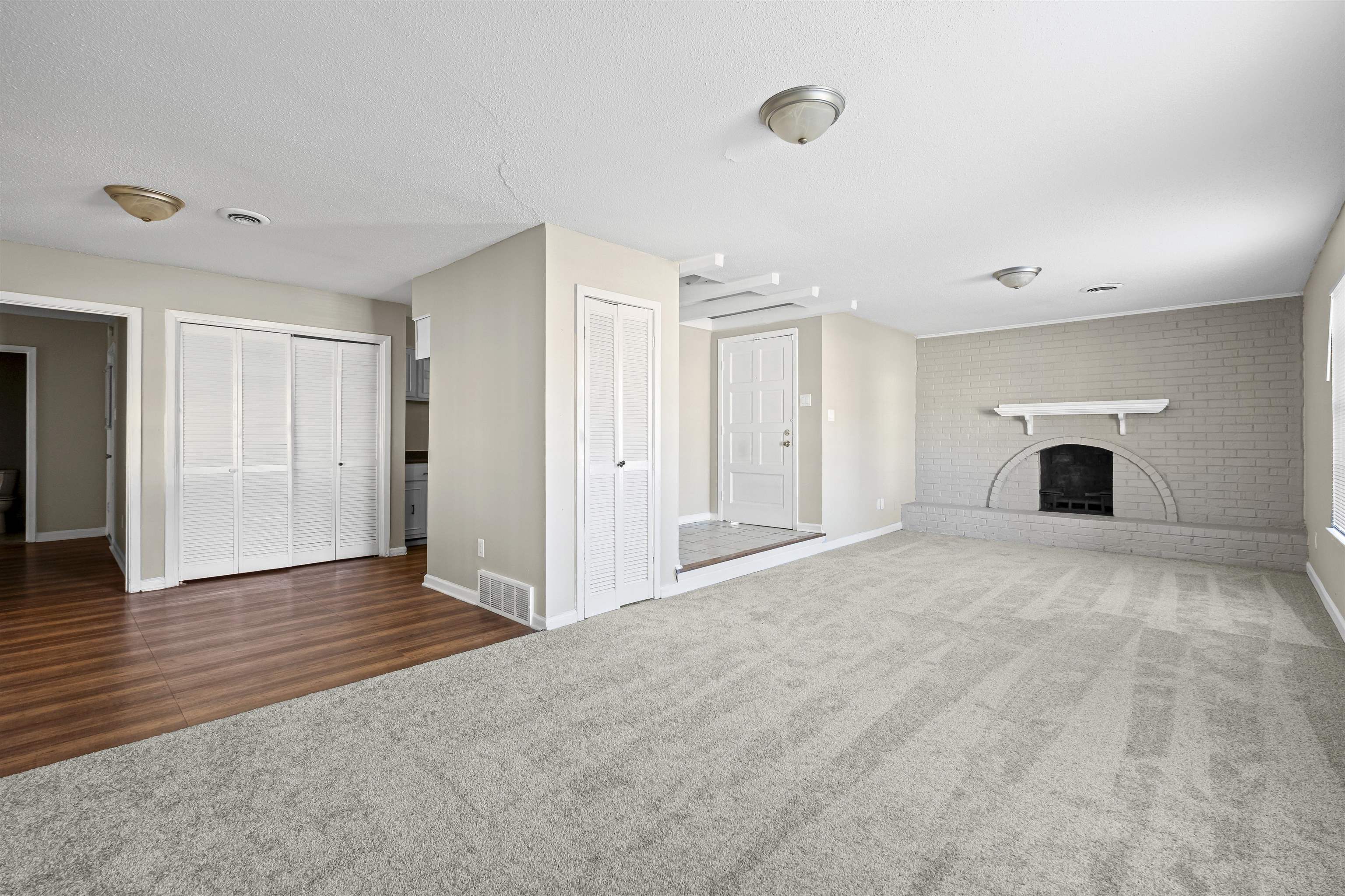 4982 Holly Ridge Drive Memphis, TN 38118 - Photo 7 of 26 a view of empty room with a fireplace