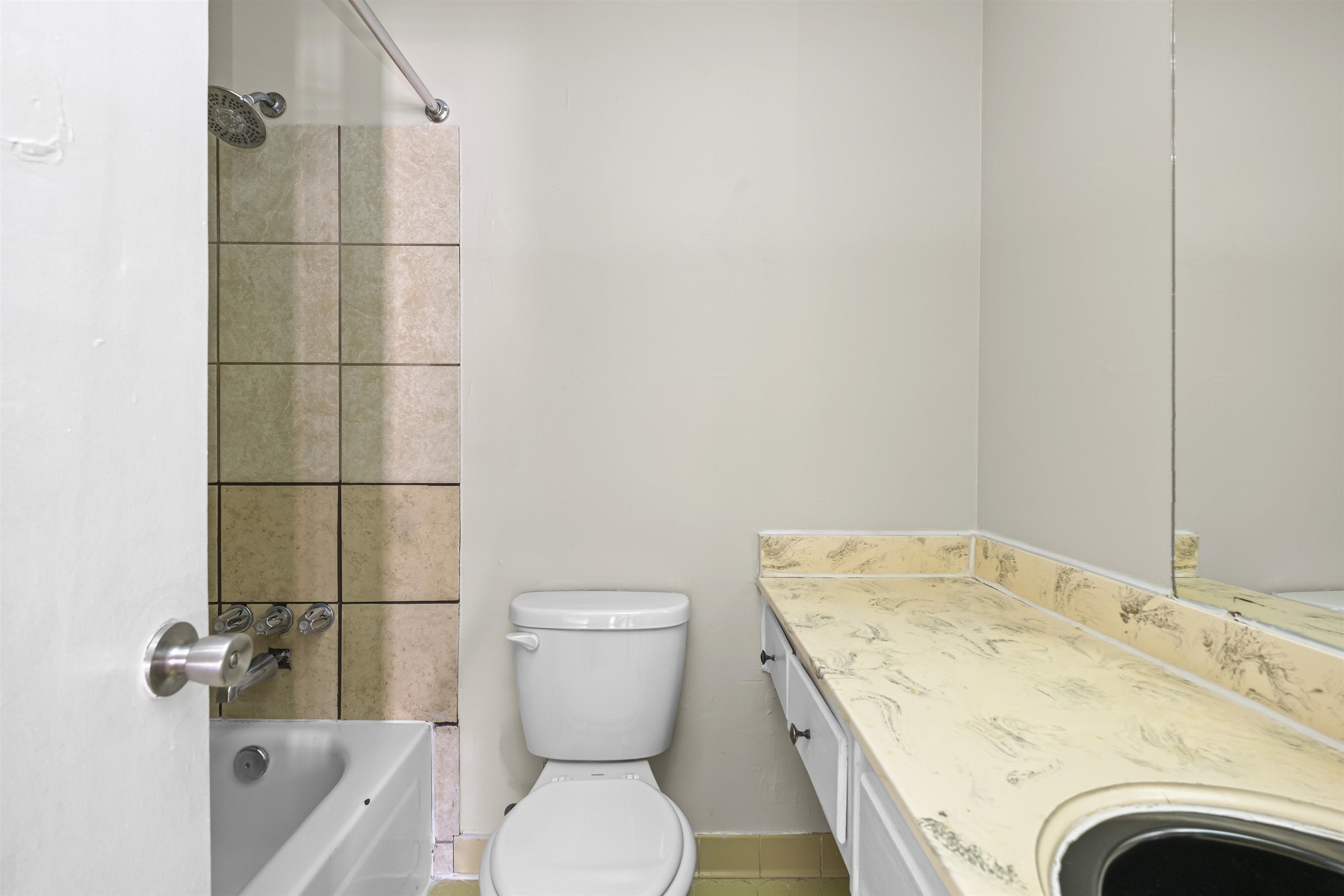 4982 Holly Ridge Drive Memphis, TN 38118 - Photo 10 of 26 a bathroom with a granite countertop sink toilet and shower