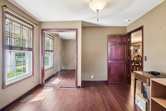 a view of a garden with an outdoor seating