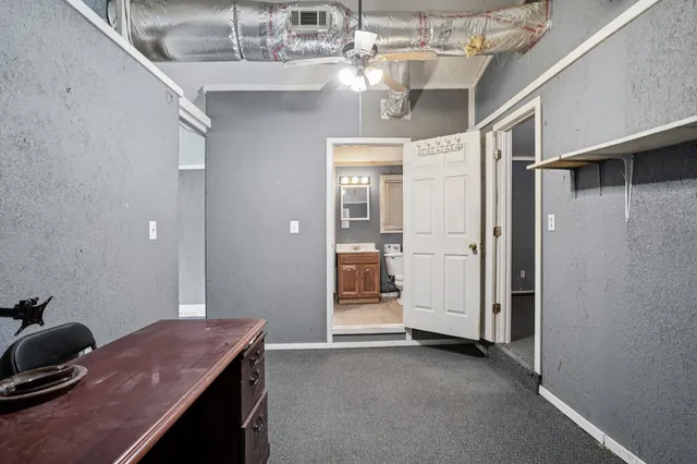 an aerial view of residential houses with outdoor space and river