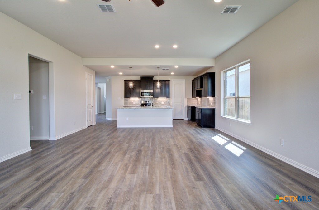 2129 Shepards Street Seguin, TX 78155 - Photo 12 of 29 a view of a living room and wooden floor