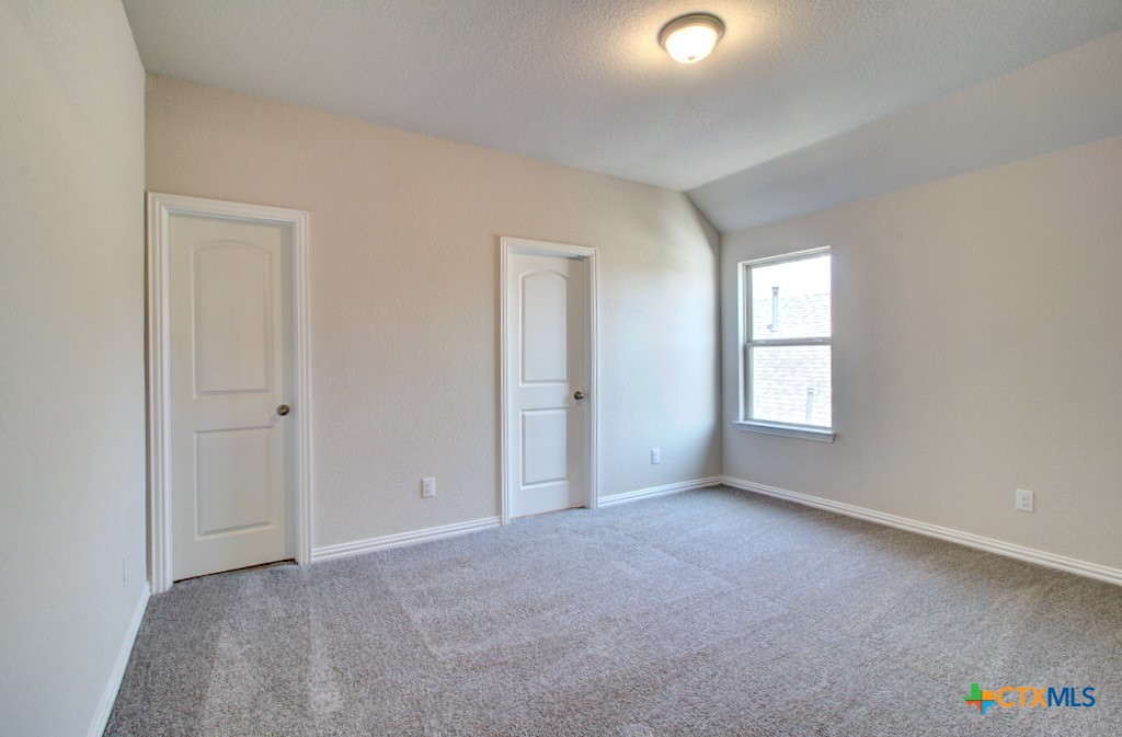 2129 Shepards Street Seguin, TX 78155 - Photo 23 of 29 an empty room with windows and closet
