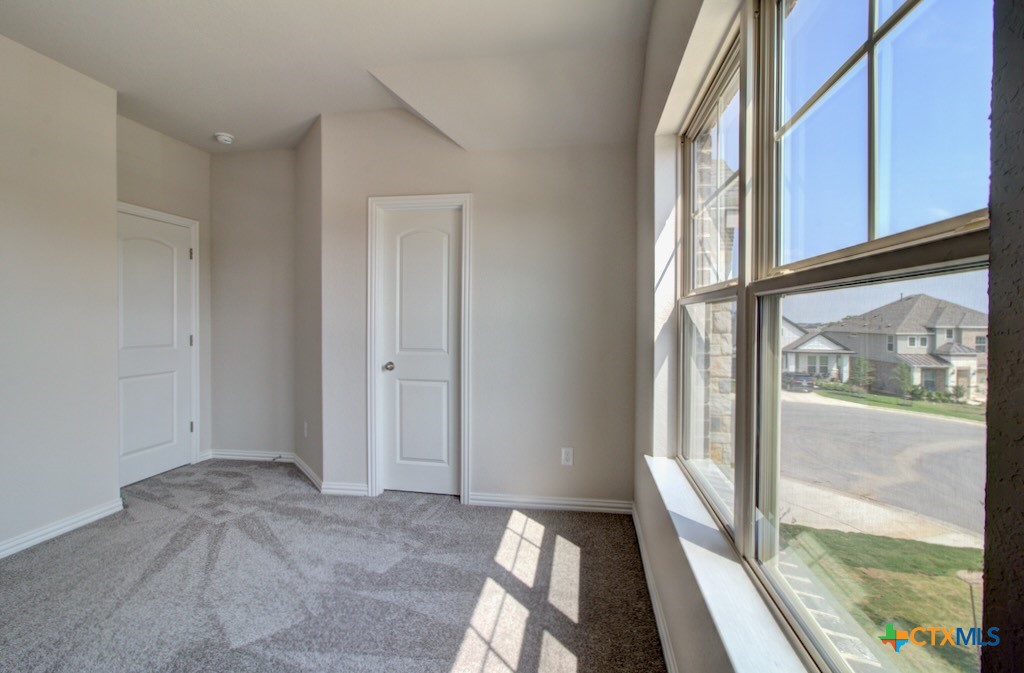 2129 Shepards Street Seguin, TX 78155 - Photo 29 of 29 a view of bedroom with wooden floor and front door