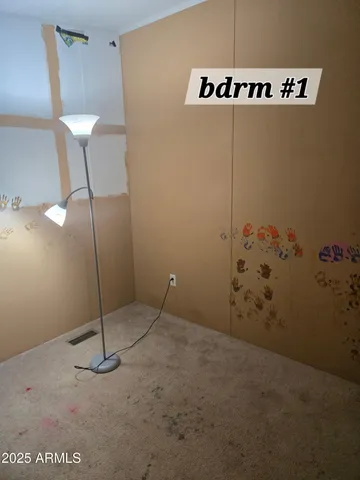 a view of a room with racks on the wall