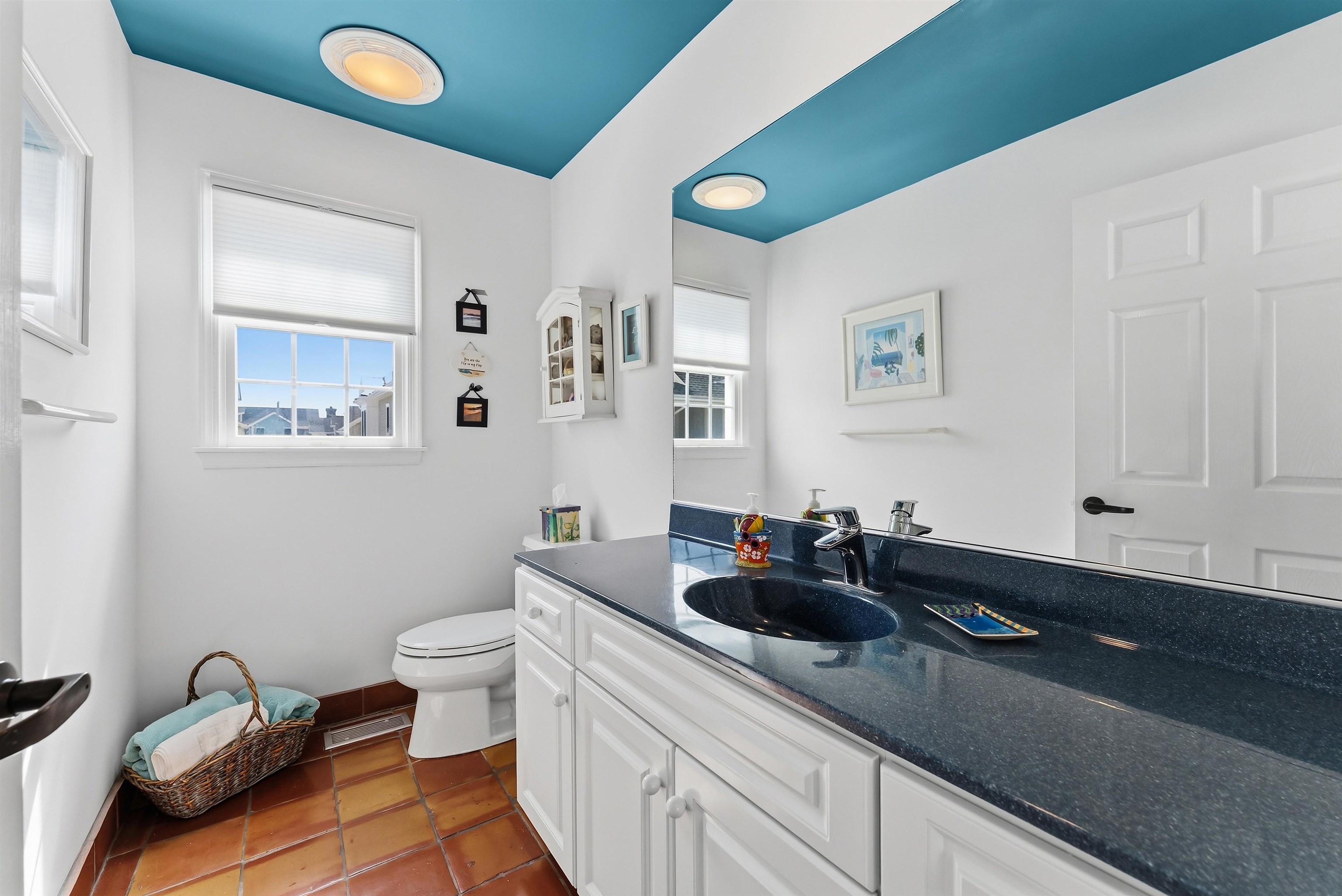 125 98th Street Stone Harbor, NJ 08247 - Photo 25 of 42 a kitchen with a sink and cabinets