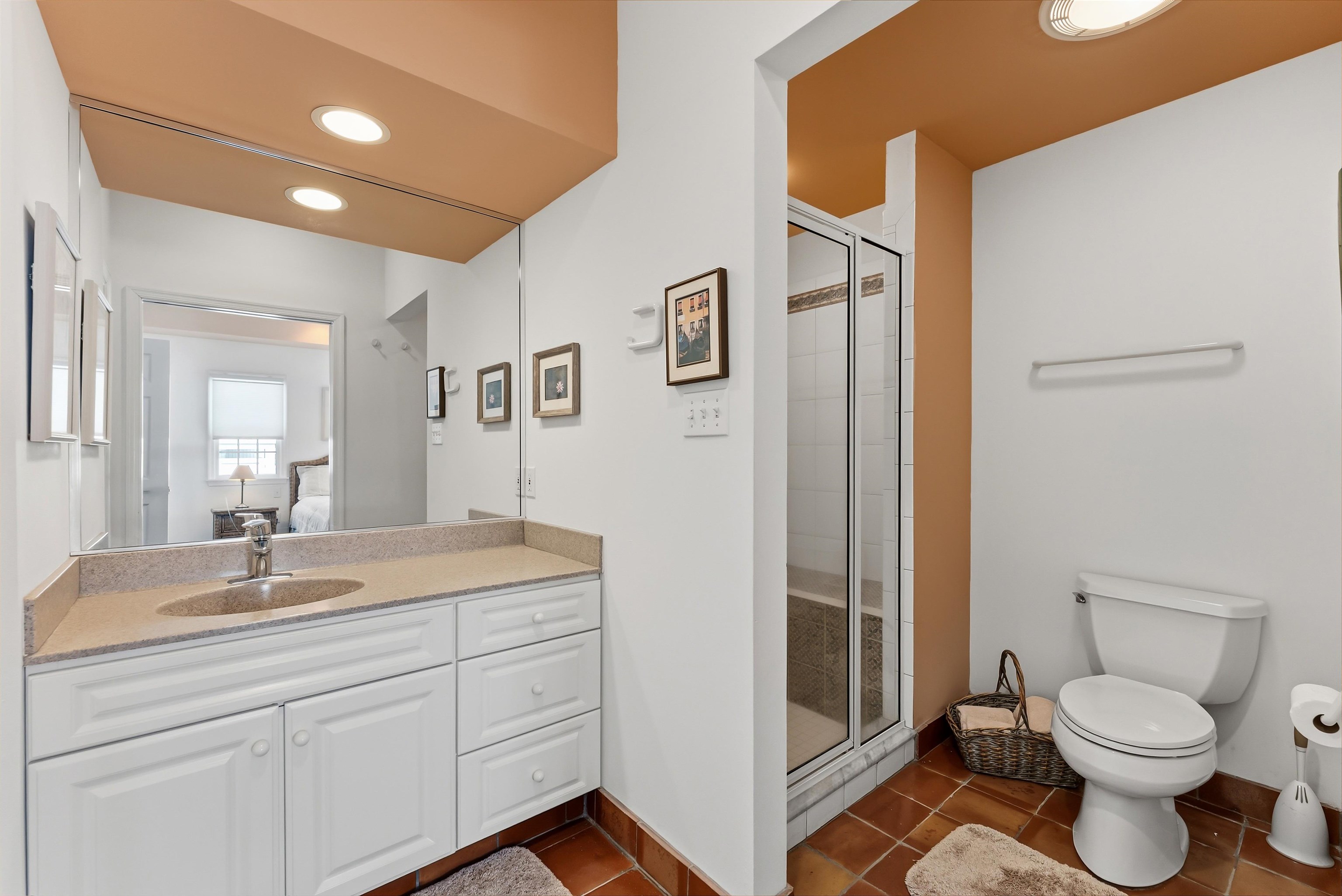 125 98th Street Stone Harbor, NJ 08247 - Photo 34 of 42 a bathroom with a granite countertop sink toilet and shower
