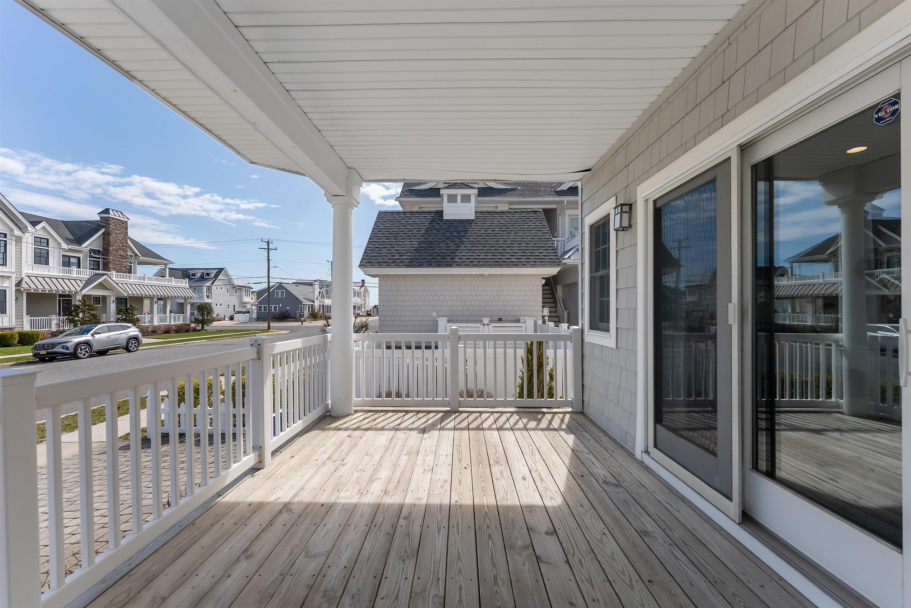 125 98th Street Stone Harbor, NJ 08247 - Photo 35 of 42 a view of a balcony with wooden floor