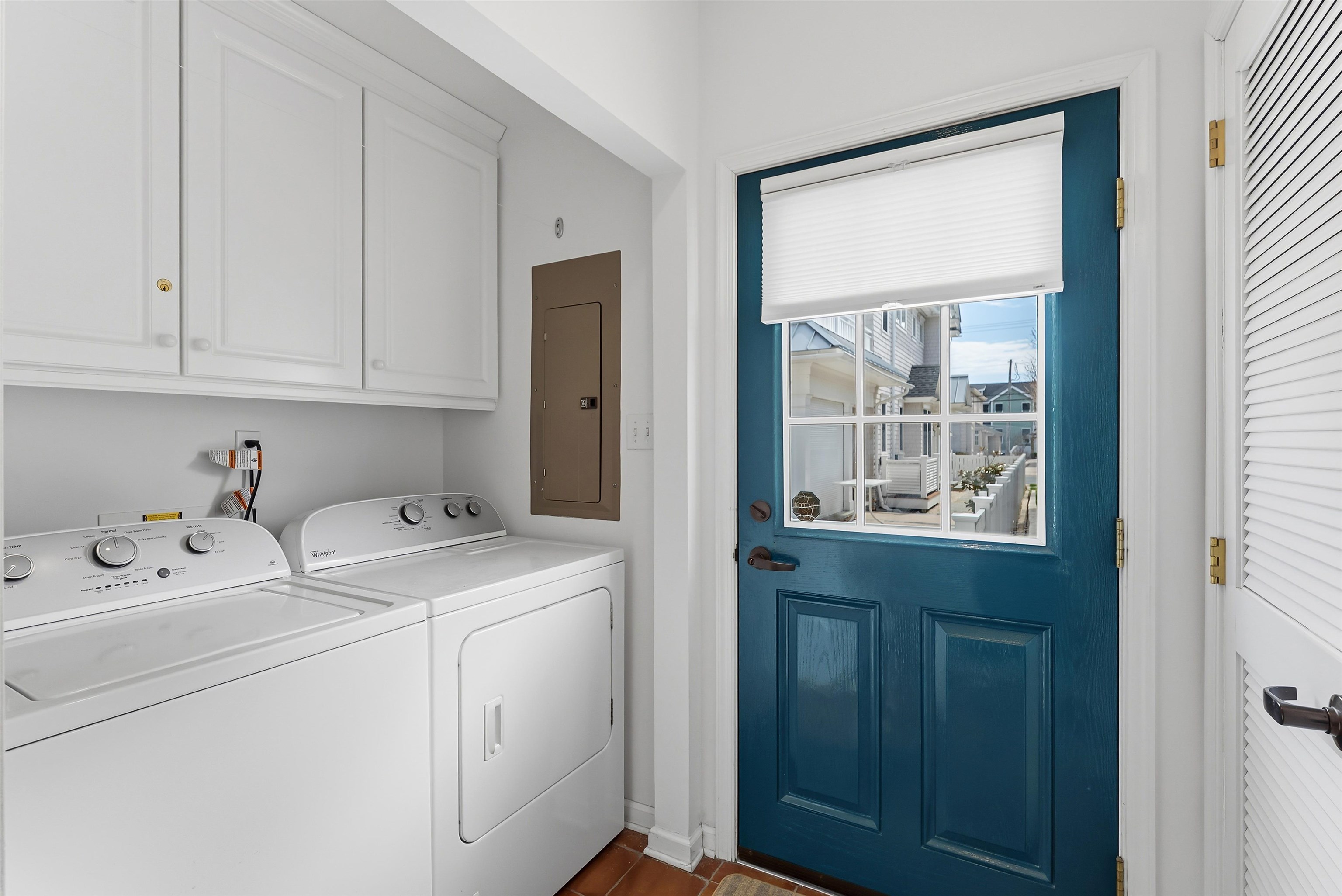 125 98th Street Stone Harbor, NJ 08247 - Photo 36 of 42 a utility room with dryer and washer