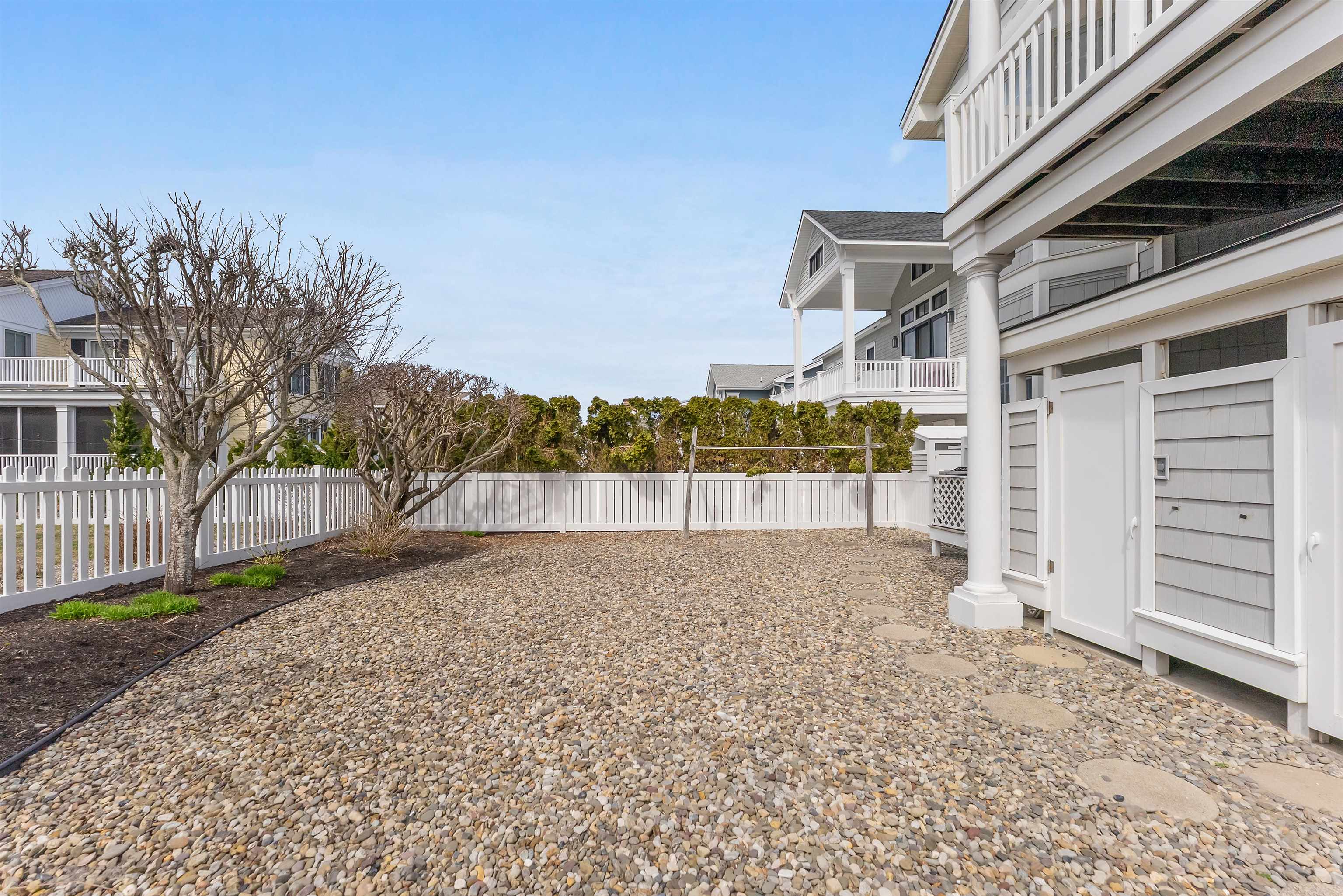 125 98th Street Stone Harbor, NJ 08247 - Photo 39 of 42 a view of a house with a yard