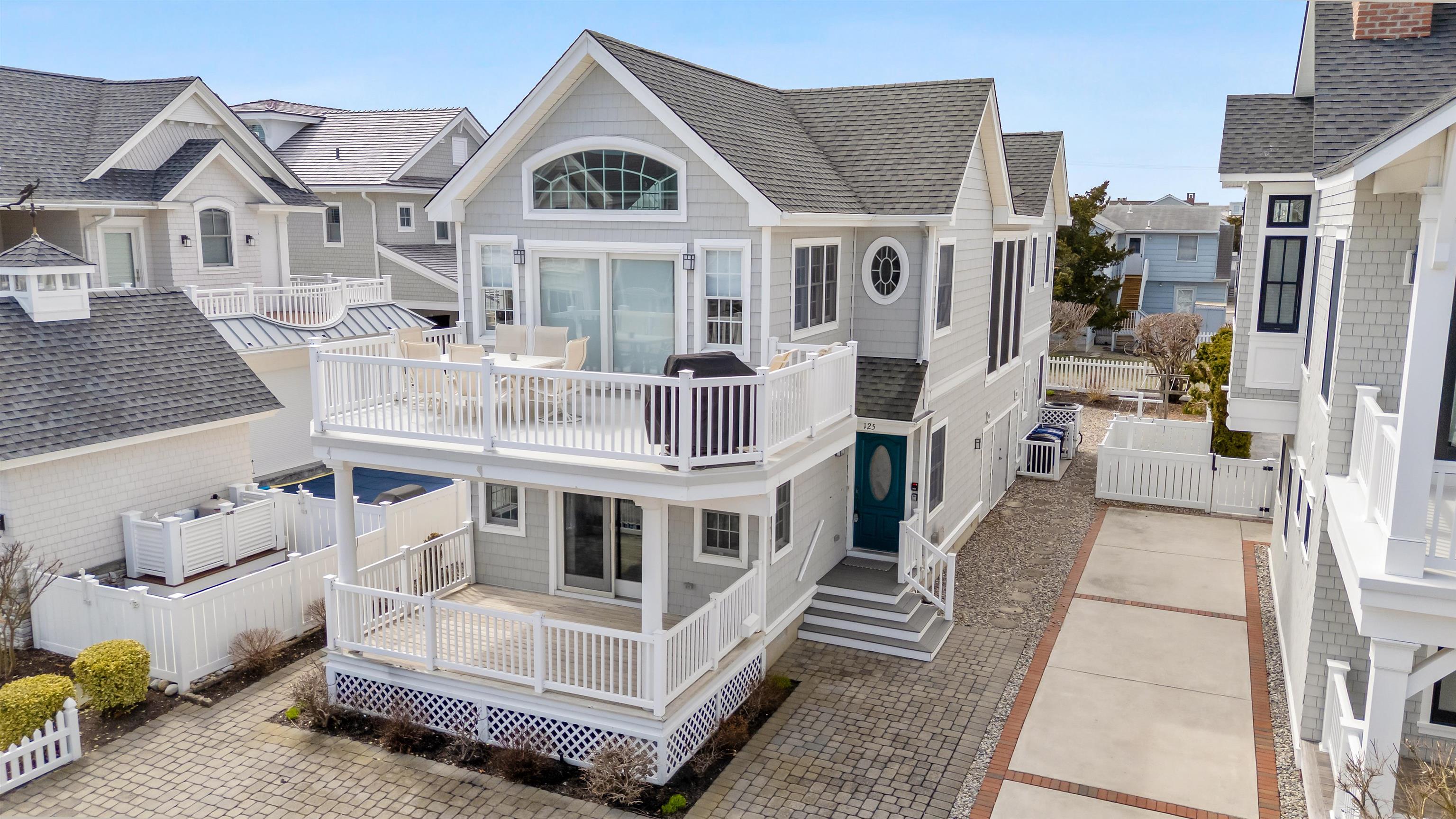 125 98th Street Stone Harbor, NJ 08247 - Photo 42 of 42 a view of a white building with a white roof