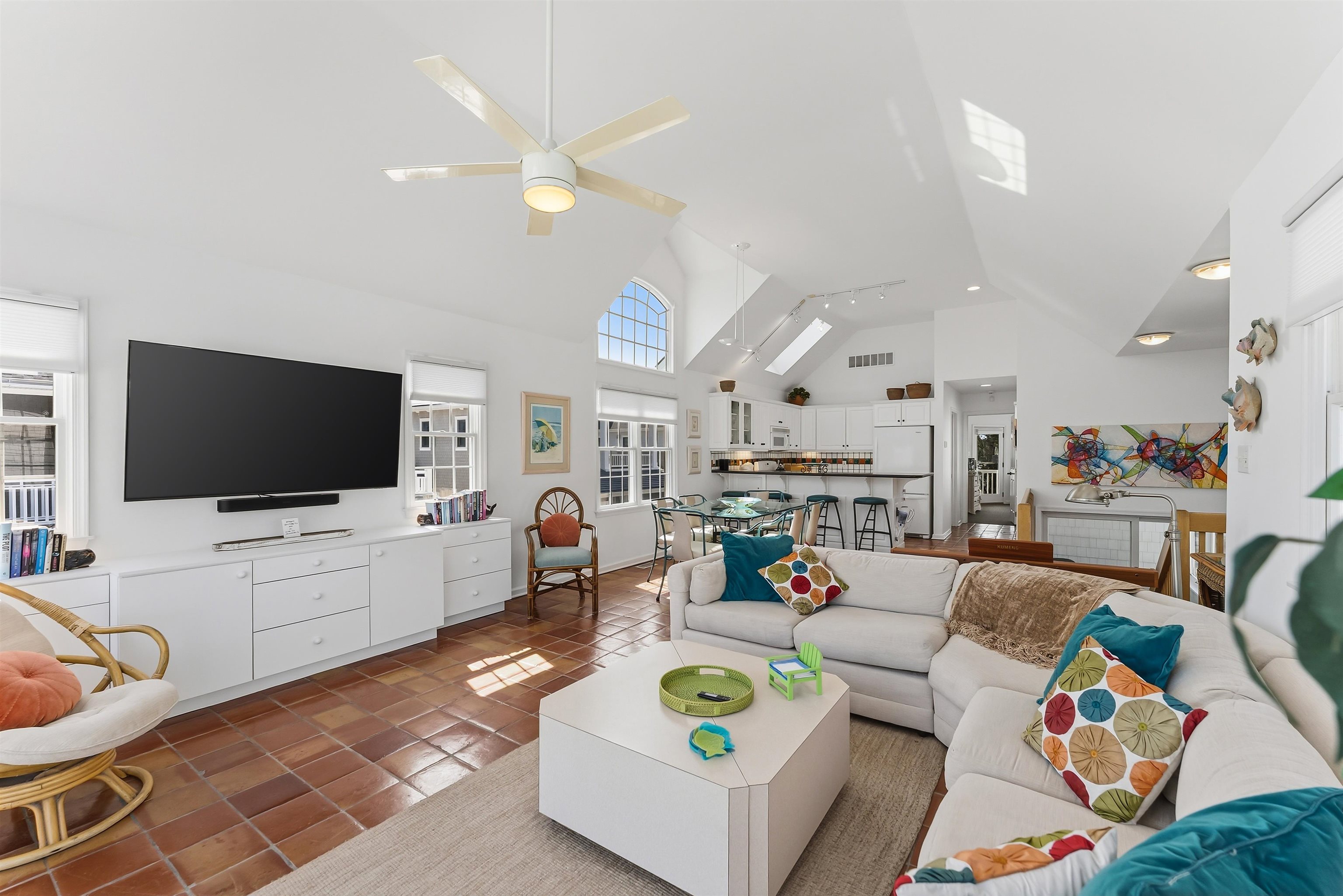 125 98th Street Stone Harbor, NJ 08247 - Photo 6 of 42 a living room with furniture and a flat screen tv