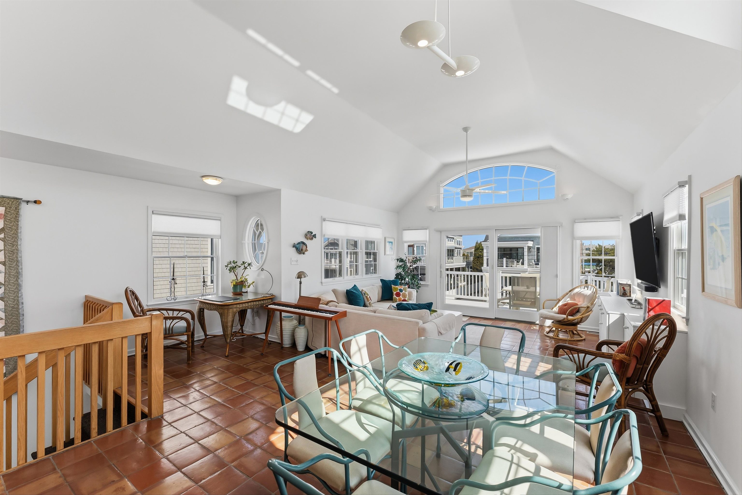 125 98th Street Stone Harbor, NJ 08247 - Photo 8 of 42 a view of a dining room with furniture window and outside view