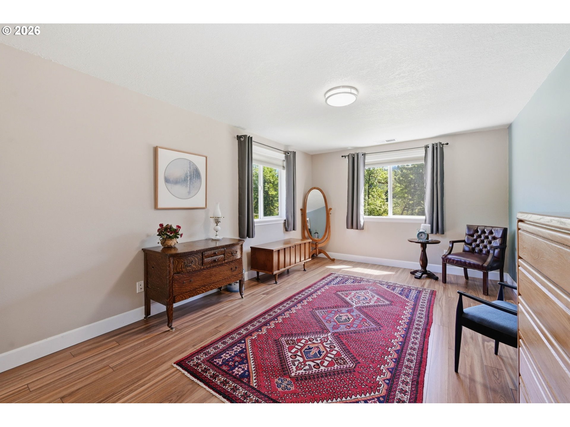 29778 Gimpl Hill Road Eugene, OR 97405 - Photo 24 of 43 a living room with furniture a window and a table