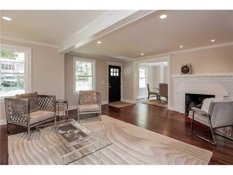 58 Middlesex Road Darien, CT 06820 - Photo 3 of 20 a living room with furniture and a fireplace