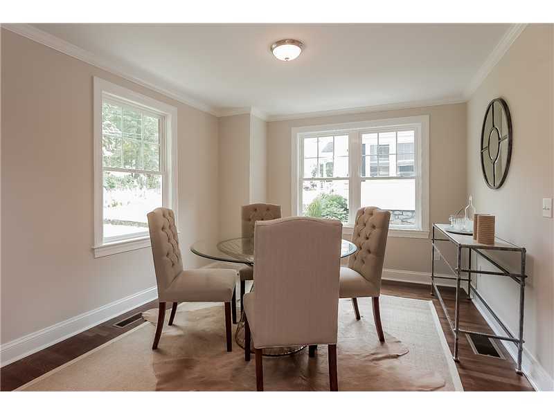 58 Middlesex Road Darien, CT 06820 - Photo 4 of 20 a view of a dining room with furniture window and wooden floor