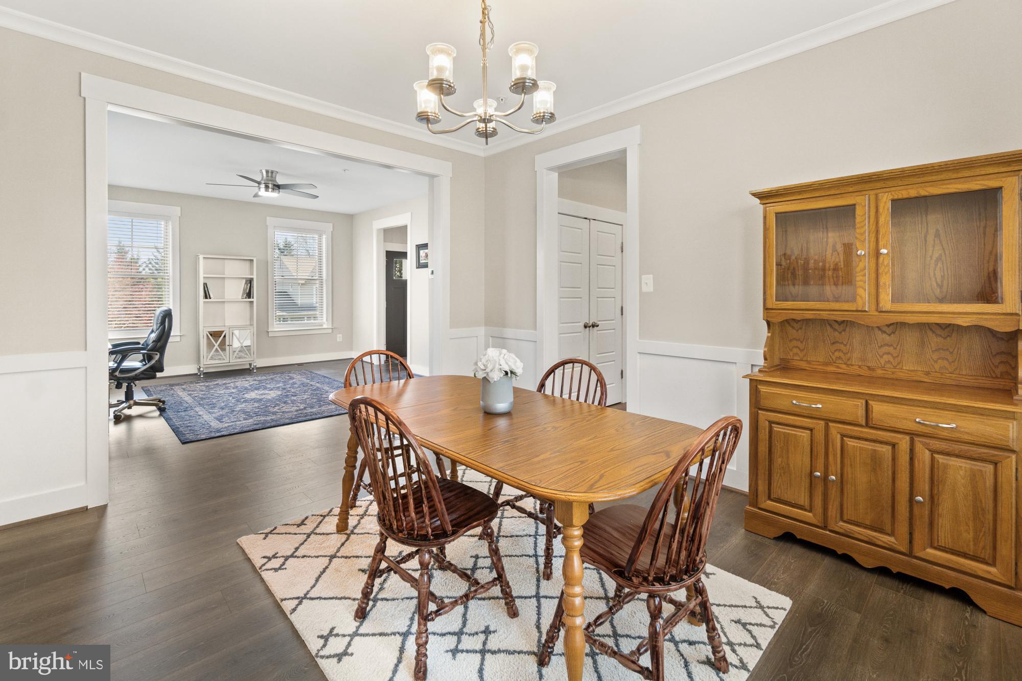 7020 Fox Chase Road New Market, MD 21774 - Photo 24 of 58 Dining room opens to the living room.