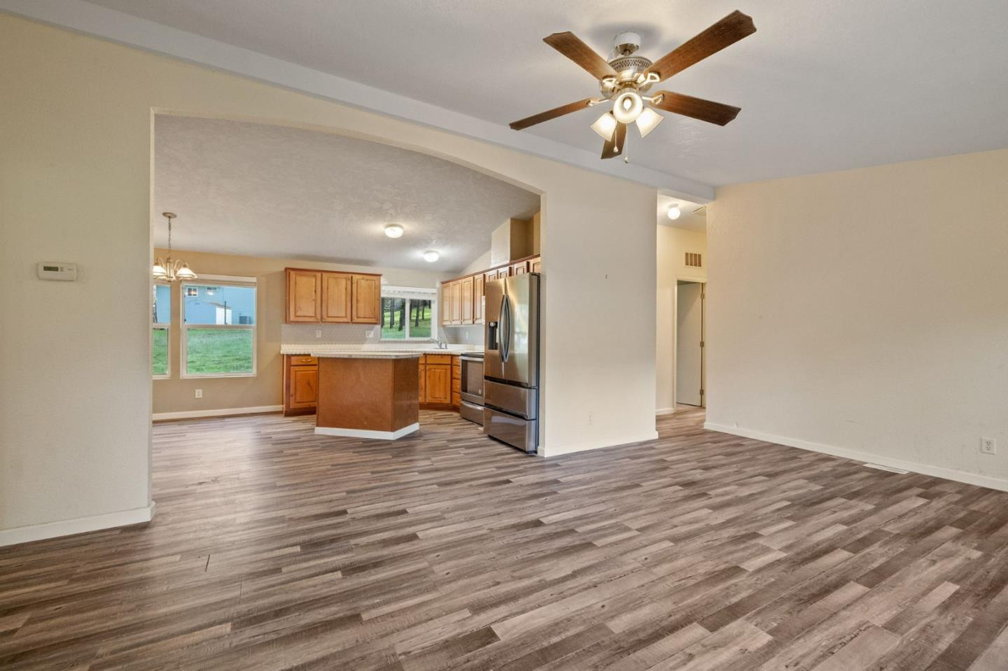 19307 Ferretti Road Groveland, CA 95321 - Photo 4 of 33 a view of a kitchen with a sink and a refrigerator