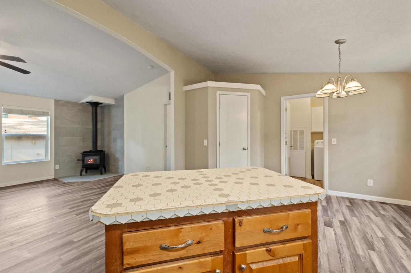 19307 Ferretti Road Groveland, CA 95321 - Photo 8 of 33 a view of a kitchen and a chandelier