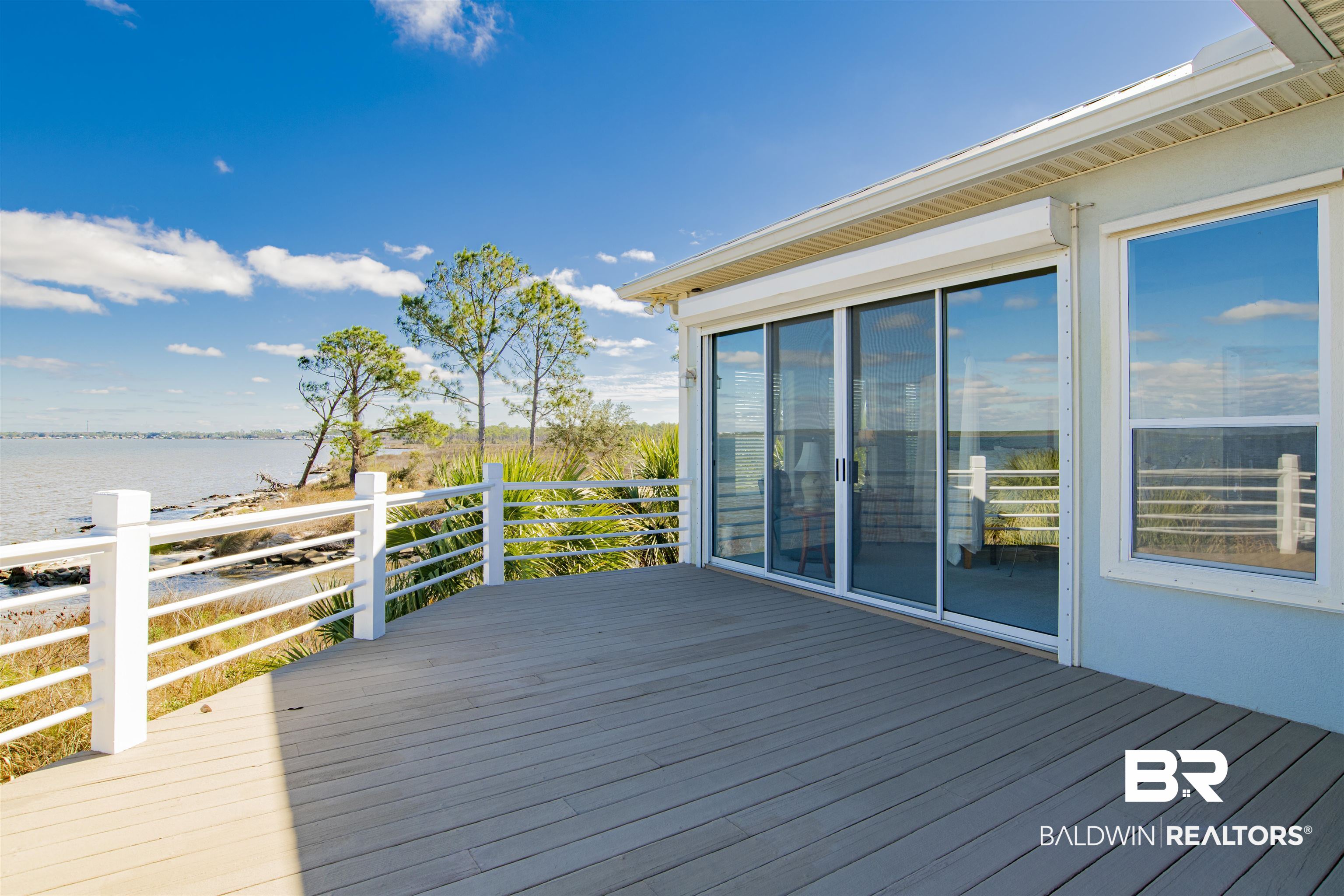 24615 Gulf Bay Road Orange Beach, AL 36561 - Photo 17 of 47 SLIDING DOORS OFF LIVING ROOM AND MASTER BR