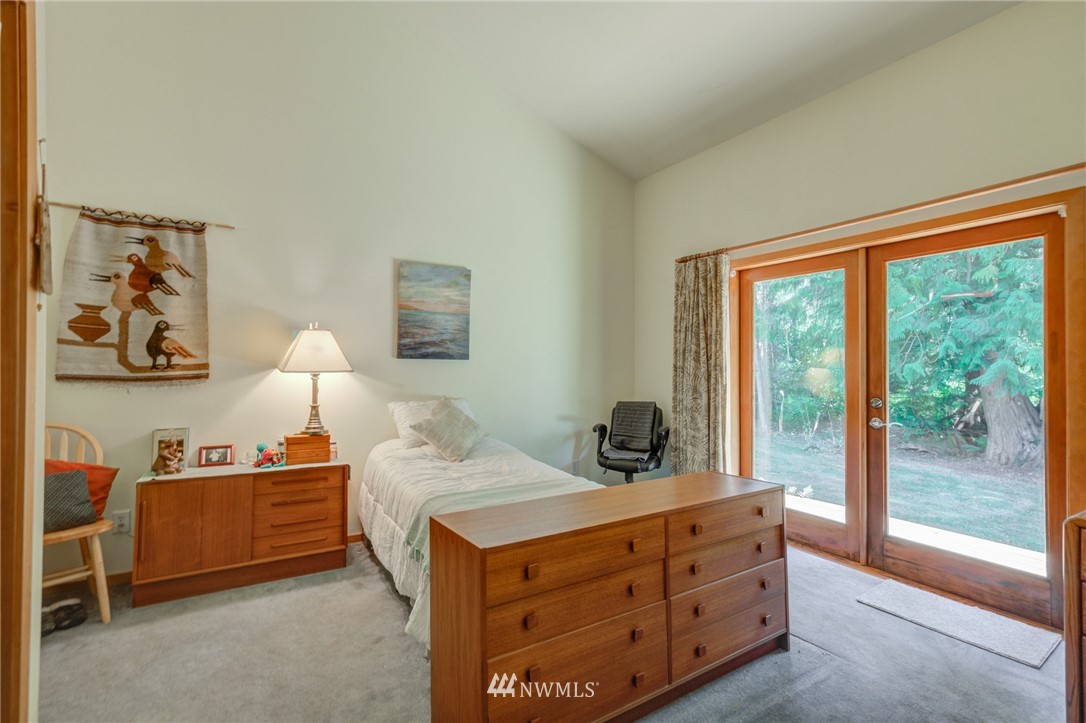 7565 Bear Ridge Way Maple Falls, WA 98266 - Photo 12 of 25 a bedroom with a bed and a window