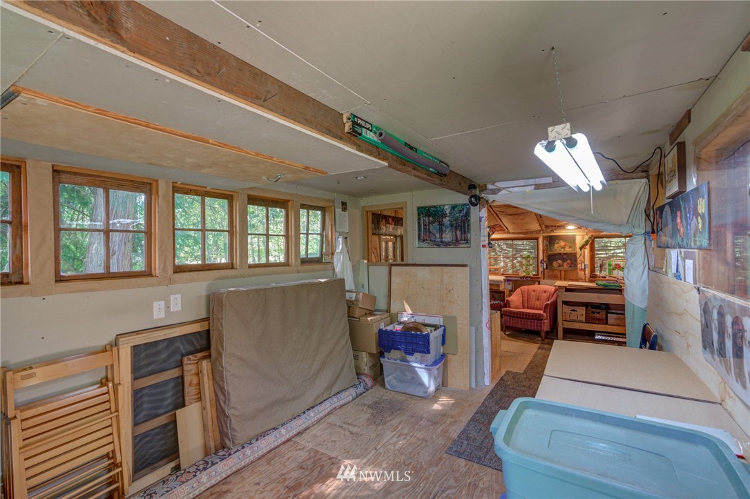 7565 Bear Ridge Way Maple Falls, WA 98266 - Photo 16 of 25 a living room with furniture and a large window