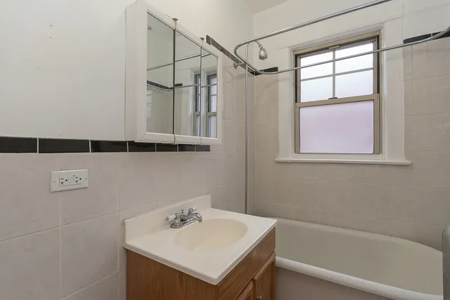 a bathroom with a sink and a bathtub