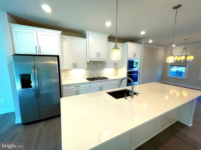 a view of room with window and hardwood floor