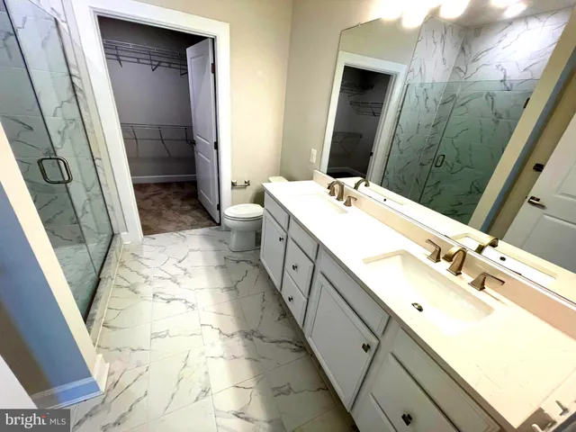 a view of empty room with window and stairs