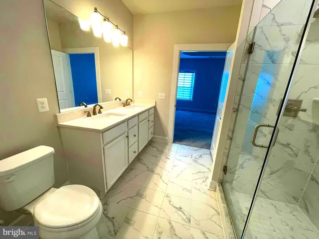 a view of empty room with windows