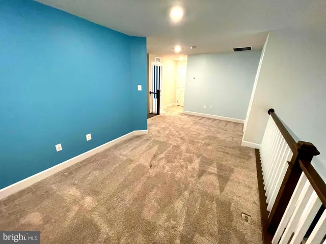 a front view of house with yard and outdoor seating