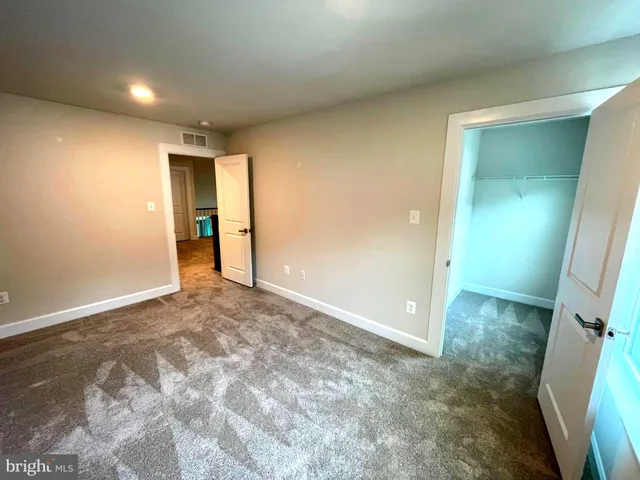 a dining table with stainless steel appliances kitchen island granite countertop a table and chairs