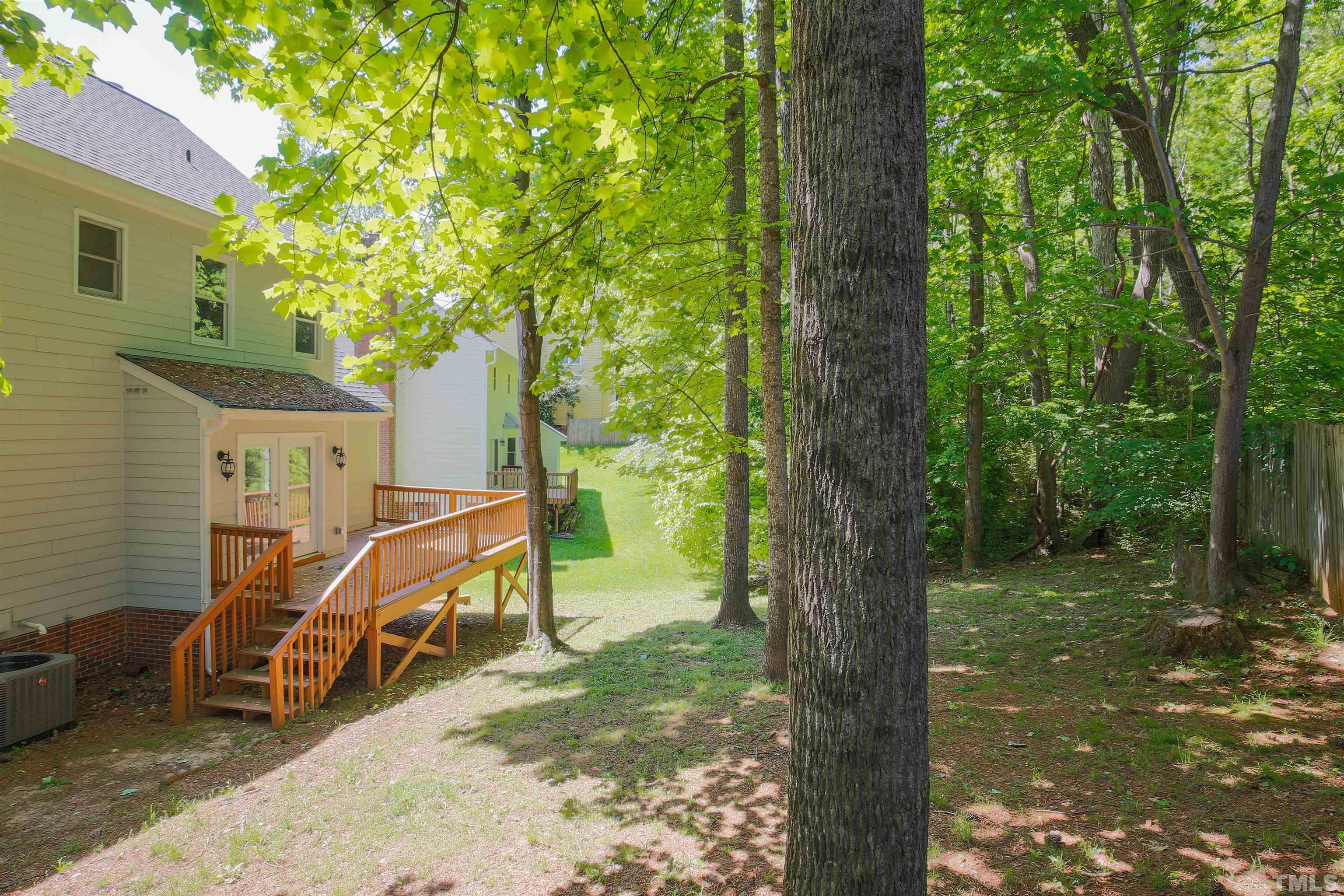 115 Kingsmill Road Cary, NC 27511 - Photo 19 of 19 a view of a wooden deck and a backyard