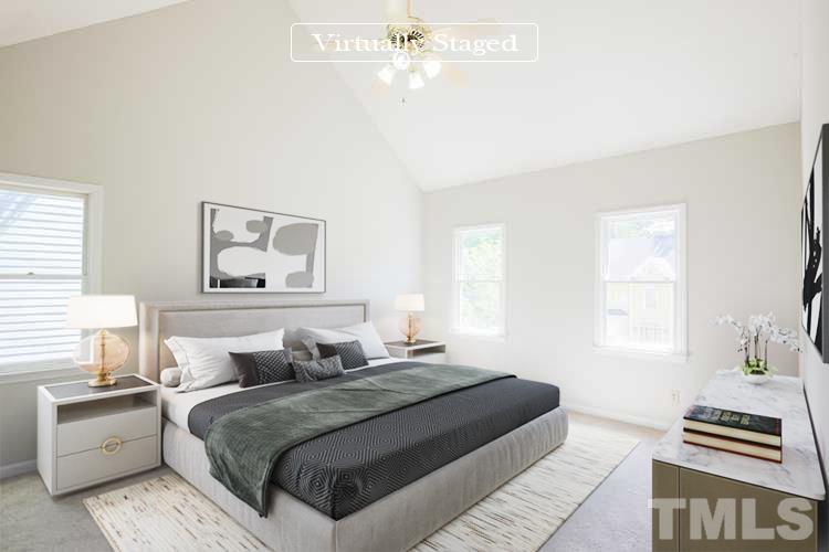 115 Kingsmill Road Cary, NC 27511 - Photo 3 of 19 a bedroom with a bed and wooden floor