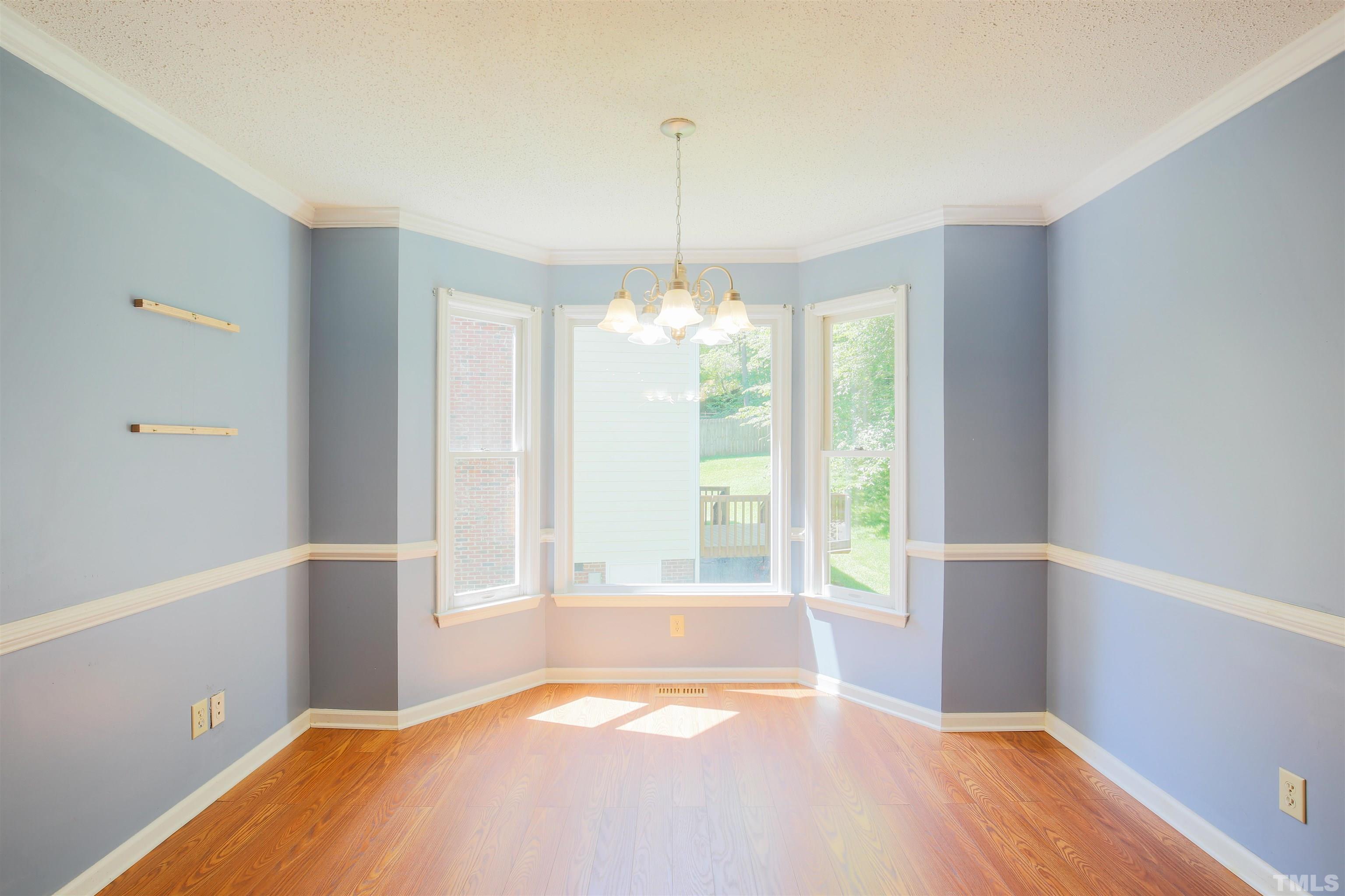 115 Kingsmill Road Cary, NC 27511 - Photo 10 of 19 a bedroom with a bed and a window
