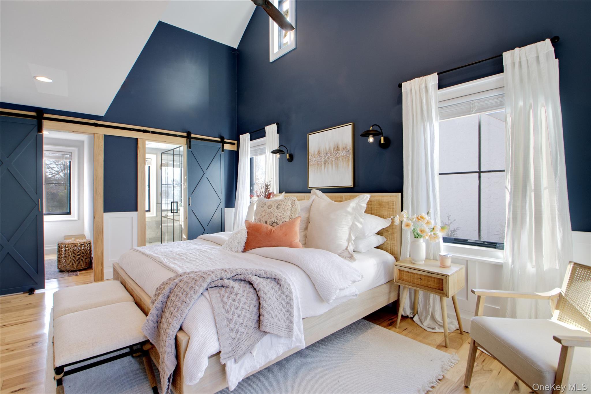 97 Bar Beach Road Port Washington, NY 11050 - Photo 18 of 28 a bedroom with a bed and a chair