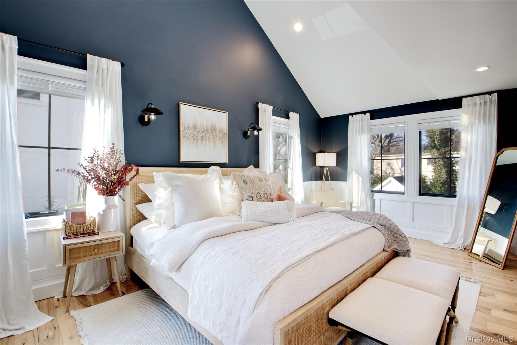 97 Bar Beach Road Port Washington, NY 11050 - Photo 21 of 28 a bedroom with a bed and wooden floor