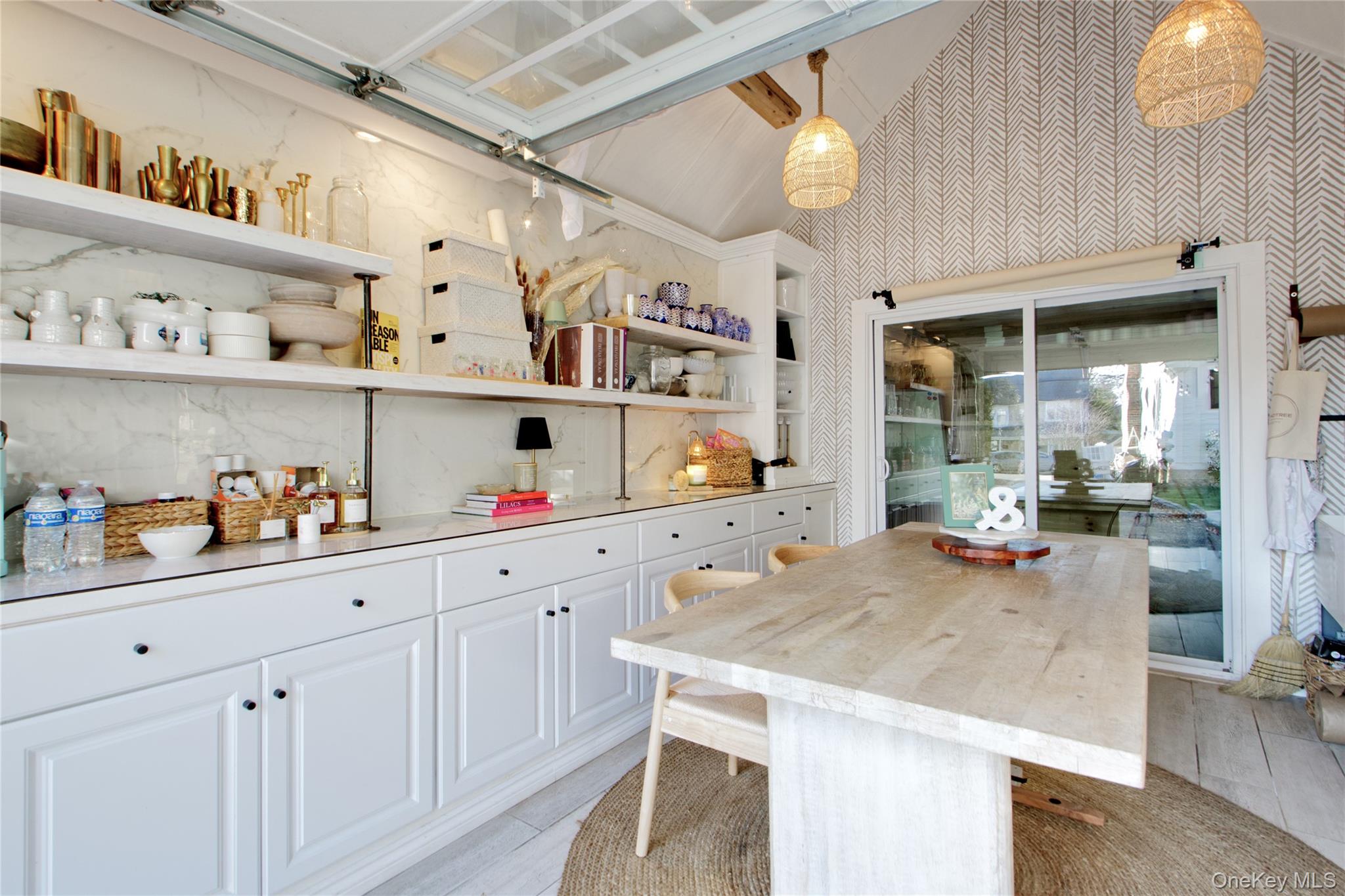 97 Bar Beach Road Port Washington, NY 11050 - Photo 25 of 28 a kitchen with cabinets and window