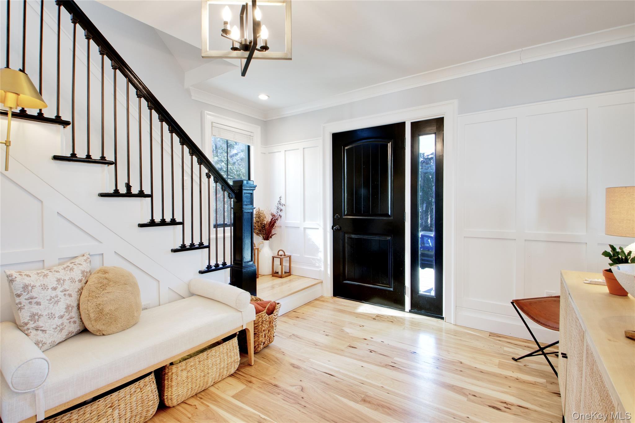 97 Bar Beach Road Port Washington, NY 11050 - Photo 4 of 28 a view of entryway and hall with wooden floor
