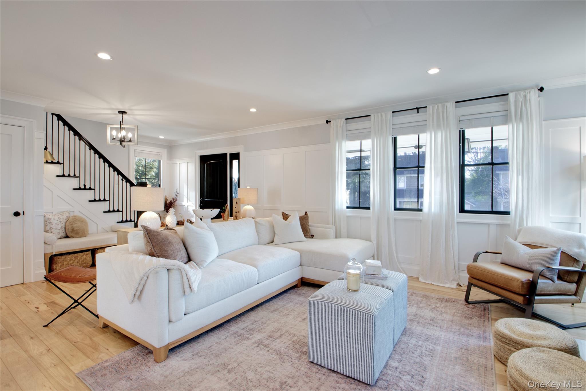 97 Bar Beach Road Port Washington, NY 11050 - Photo 6 of 28 a living room with furniture or couch and a potted plant
