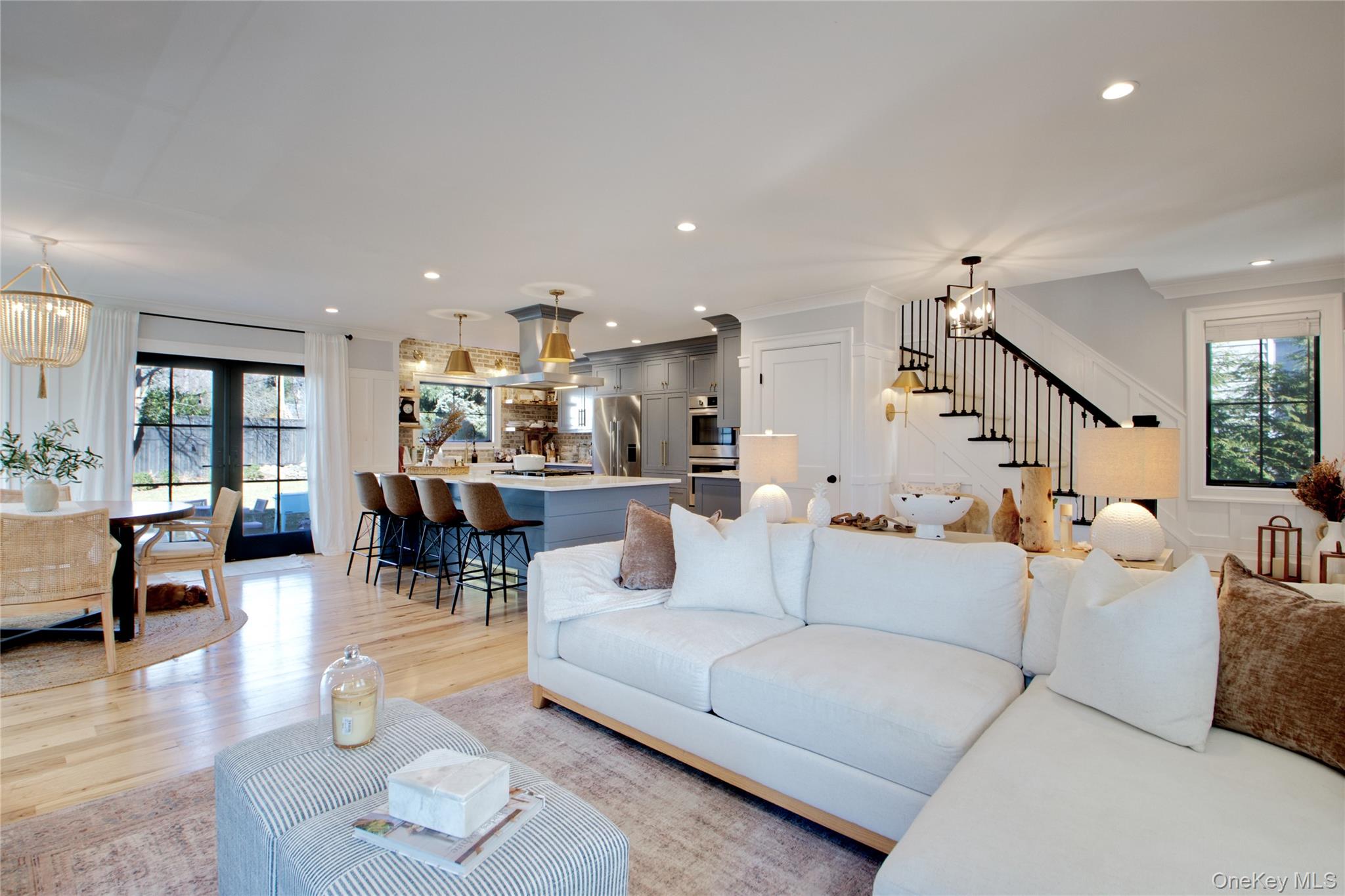 97 Bar Beach Road Port Washington, NY 11050 - Photo 7 of 28 a living room with furniture and wooden floor