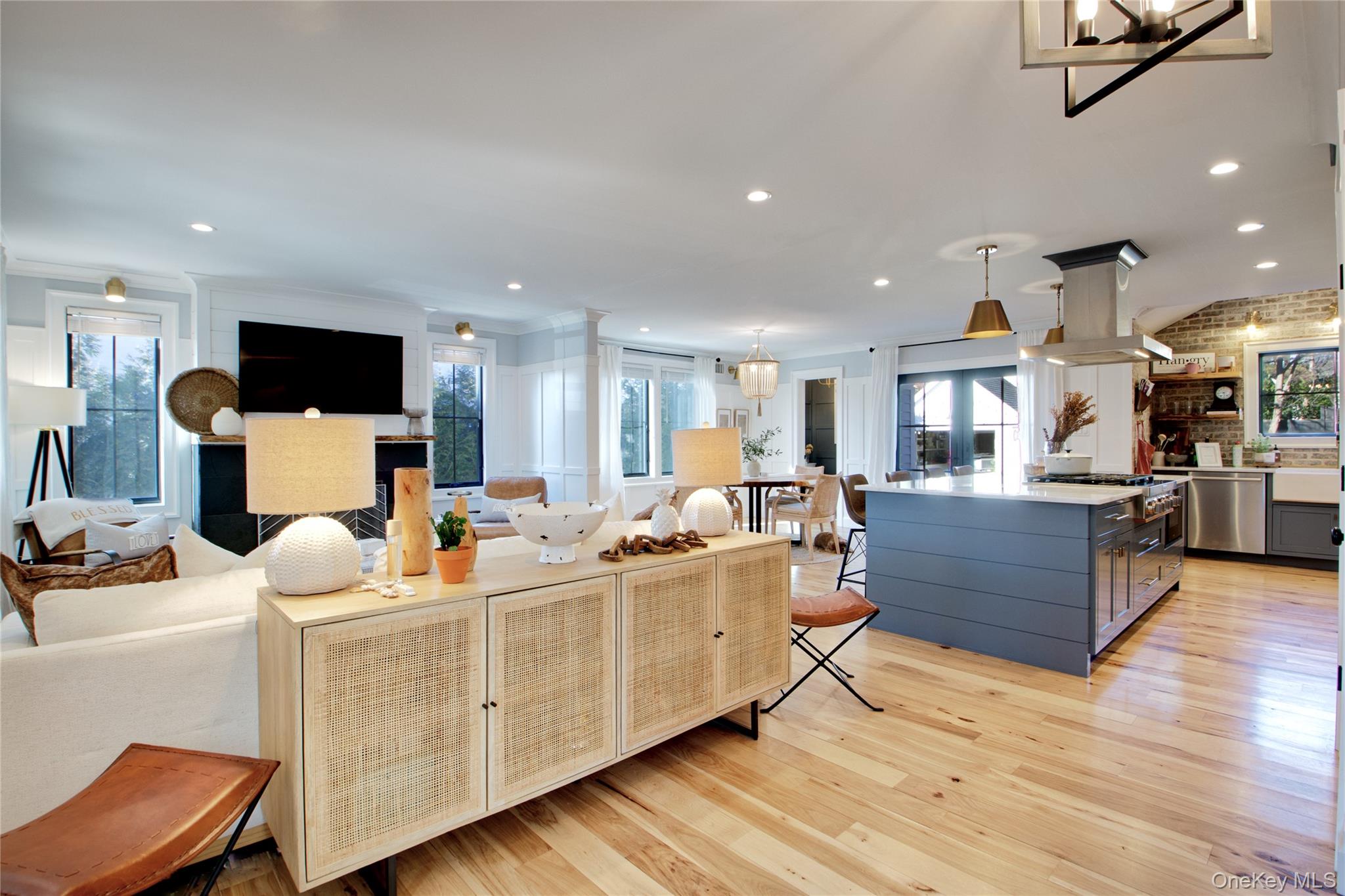 97 Bar Beach Road Port Washington, NY 11050 - Photo 9 of 28 a living room with furniture and a flat screen tv
