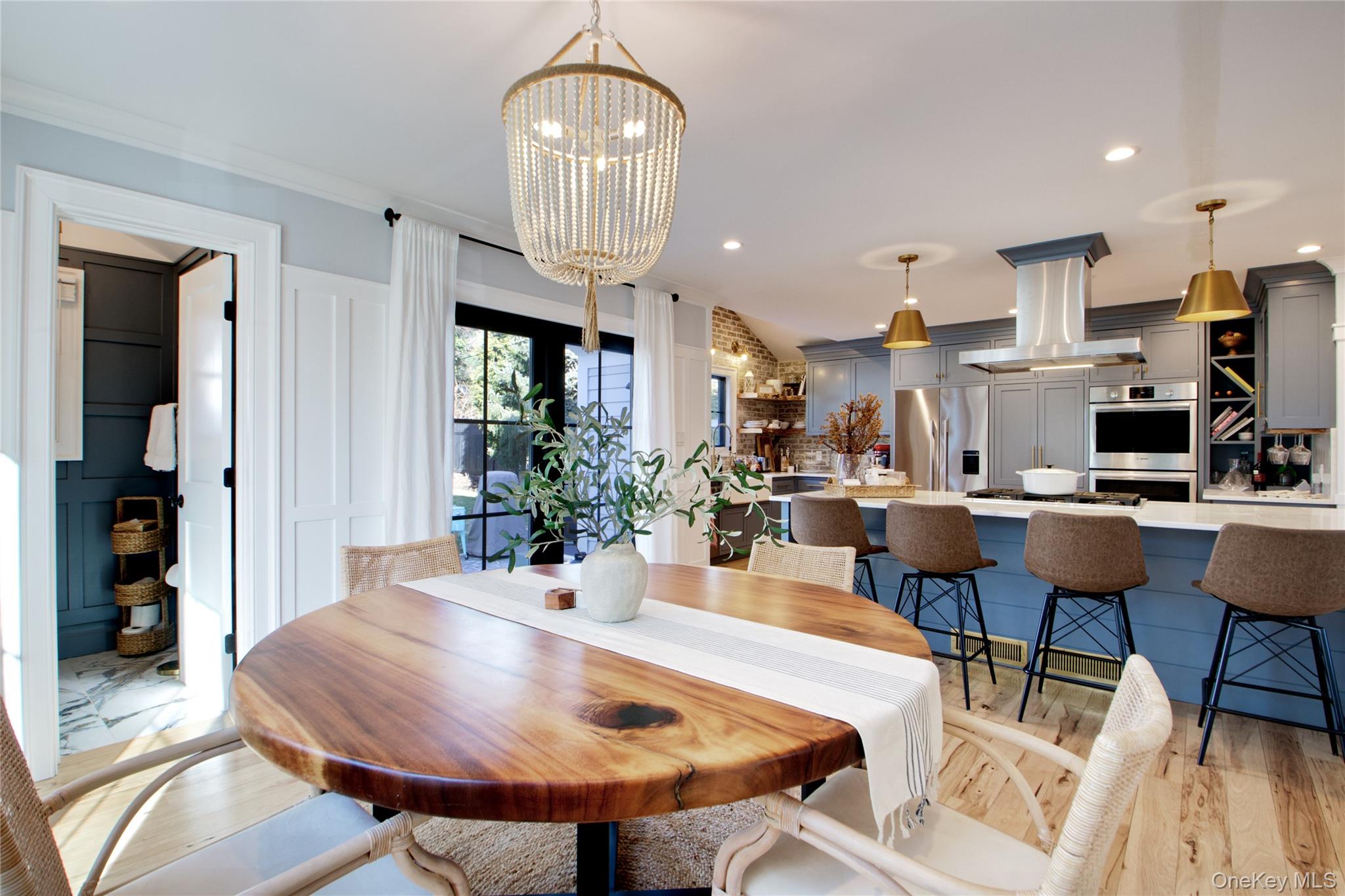 97 Bar Beach Road Port Washington, NY 11050 - Photo 10 of 28 a view of a dining room with furniture