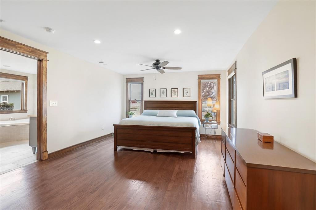 2196 Bledsoe Road Gunter, TX 75058 - Photo 17 of 33 a bedroom with furniture and a wooden floor
