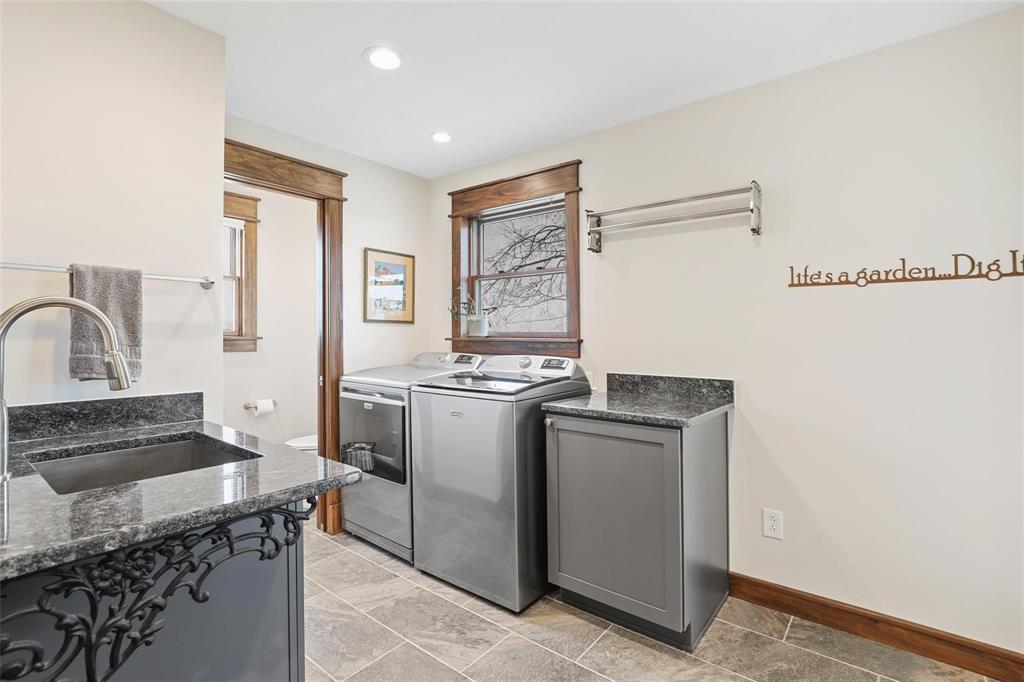 2196 Bledsoe Road Gunter, TX 75058 - Photo 24 of 33 a kitchen with a stove and a sink